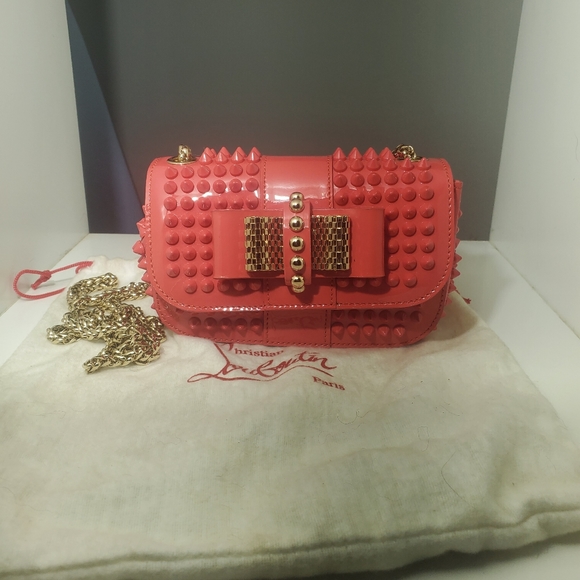 Christian Louboutin Handbags - Christian Louboutin pink sweet charity studded chain clutch